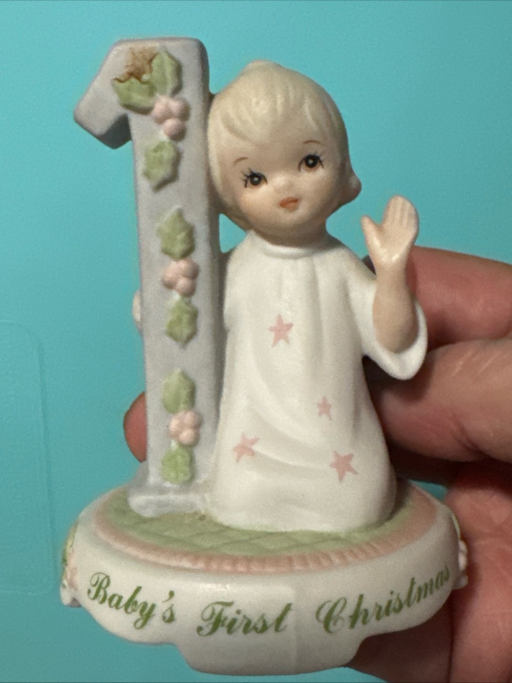 Vintage left and Christopher collection babies first Christmas figurine 1990